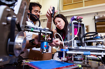 Photo of students working. Links to Glossary