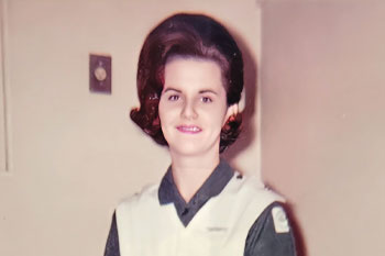 A woman smiling