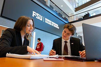 Photo of students working together. Link to Life Stage Gift Planner Under Age 45 Situations.